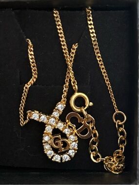 Christian Dior CD Logo
Rhinestone Gold Tone Pendant